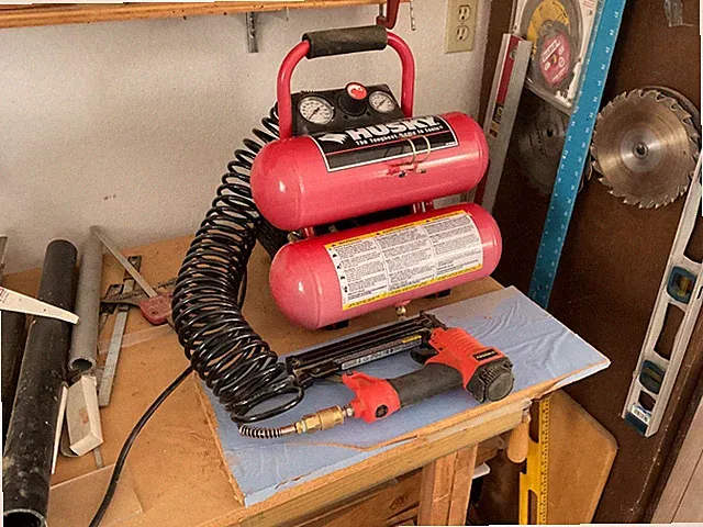Husky air compressor with nailer attachment hose plus nailer gun